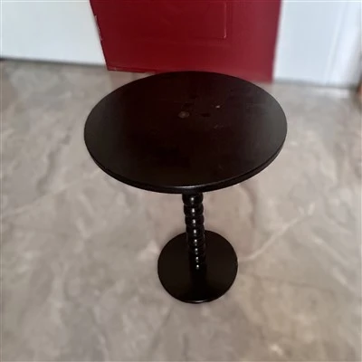 Tré svart kringlótt borð